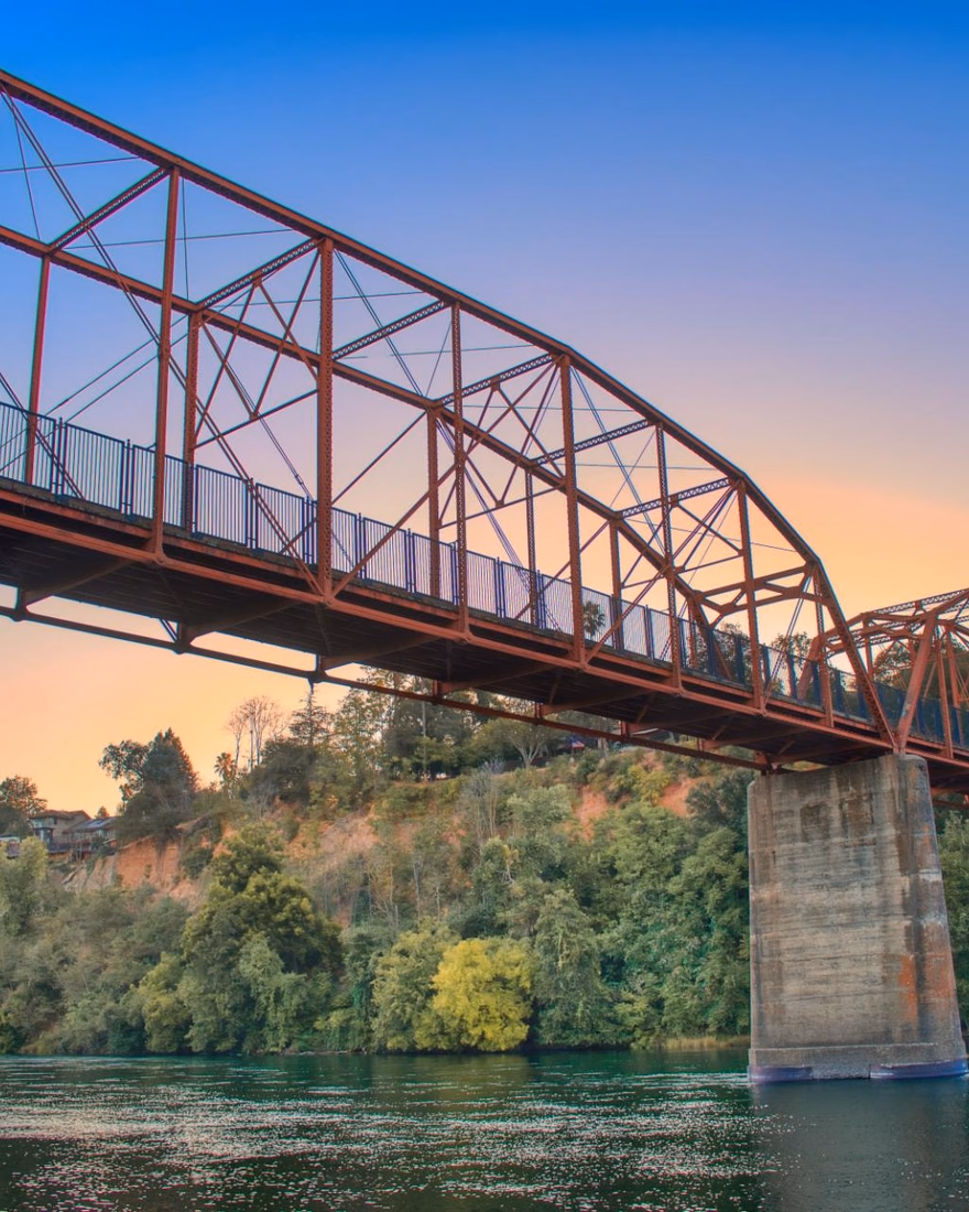 The Fair Oaks Bridge over the American River at sunset